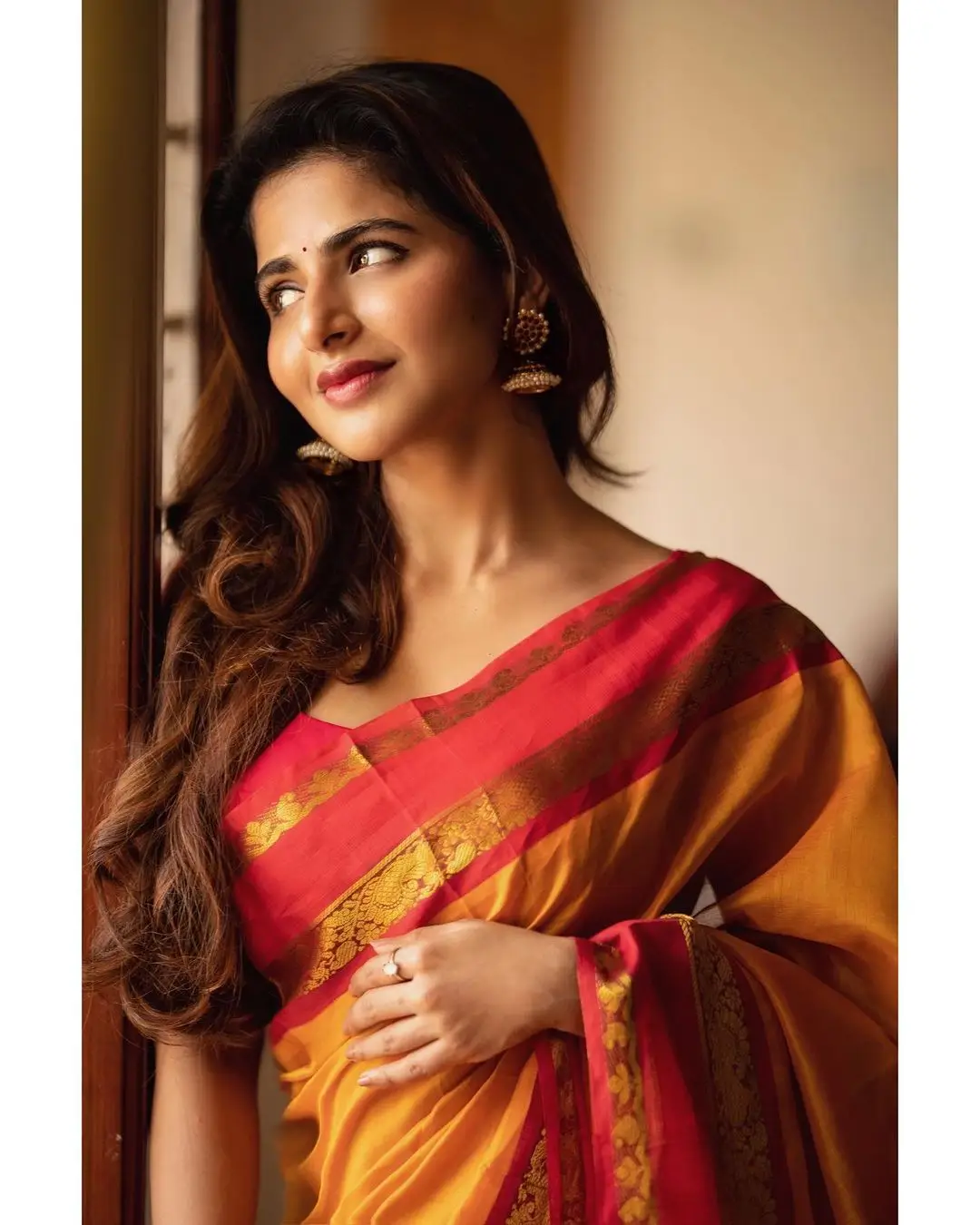 Indian Girl Iswarya Menon In Traditional Orange Saree Sleeveless Blouse